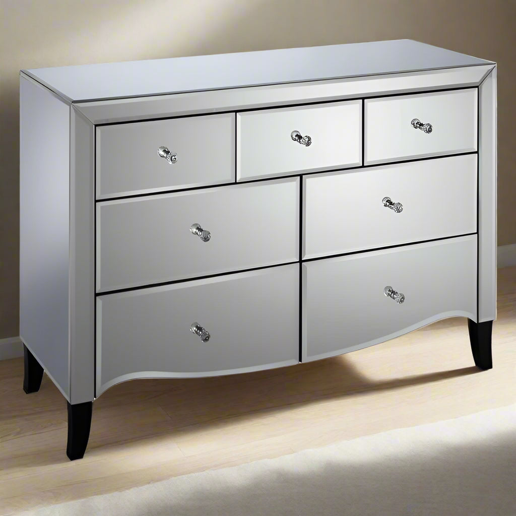 Silver dresser with six drawers and two doors, elegant and spacious storage solution for any bedroom decor.