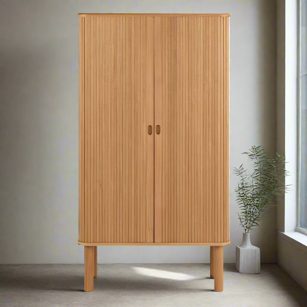 A wooden cabinet featuring two doors and a smooth wooden top, showcasing a natural finish and elegant design.