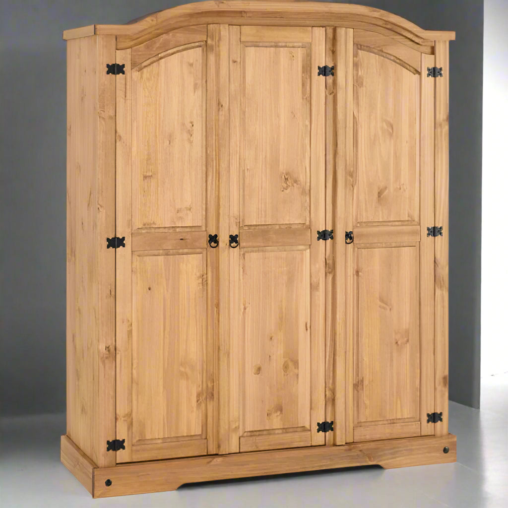 A wooden armoire with four doors, perfect for storing clothes and accessories.
