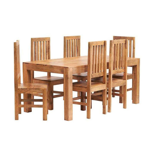 Wooden dining table with six chairs arranged neatly in a dining room.