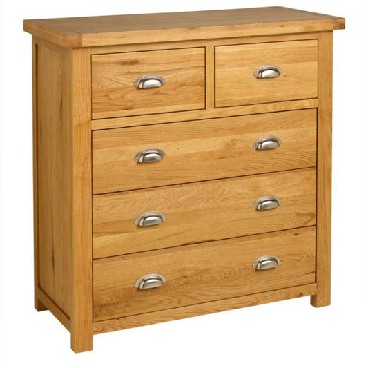 A wooden chest of drawers with four drawers and two handles.