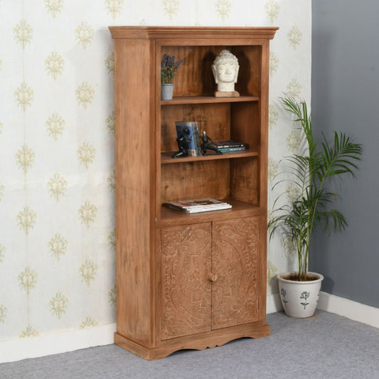 Wooden bookcase with a vase on top, adding a touch of elegance to the room decor.