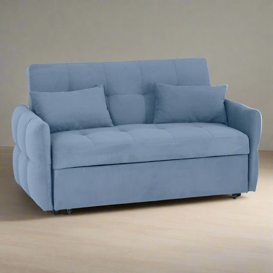 A blue sofa with pillows and a pillow.