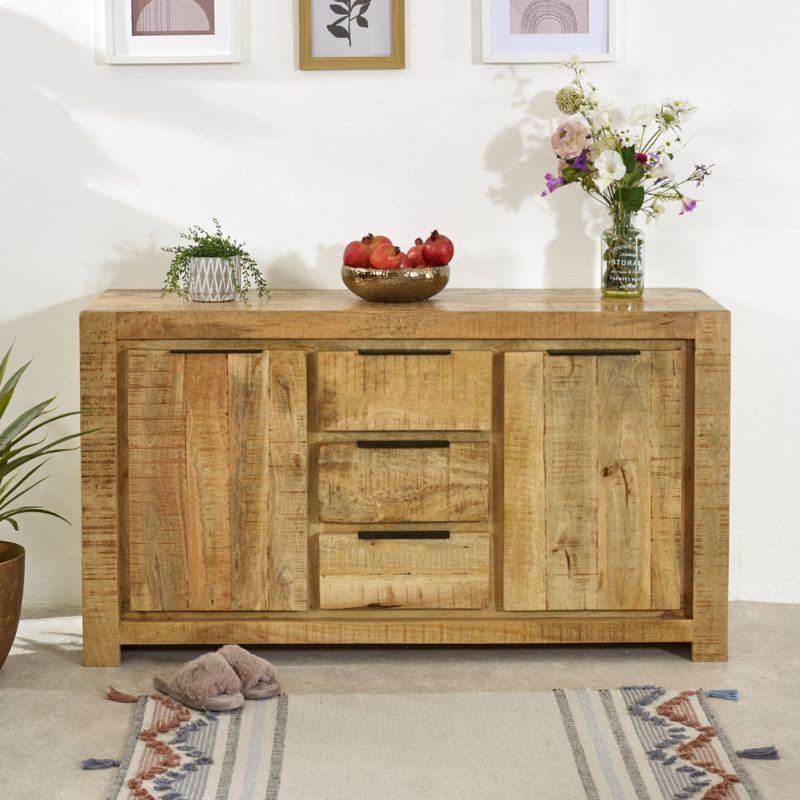 A wooden sideboard featuring drawers and a vase as a centerpiece.