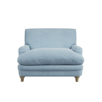 Light blue couch with wooden legs, perfect for a cozy living room setting.