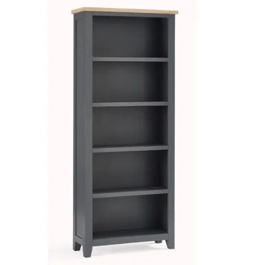  A tall grey bookcase featuring four shelves, elegantly designed to enhance any room's decor and provide ample storage space.