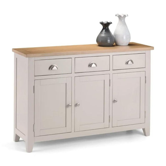 A grey painted sideboard featuring two drawers, elegantly designed for storage and display in any room.