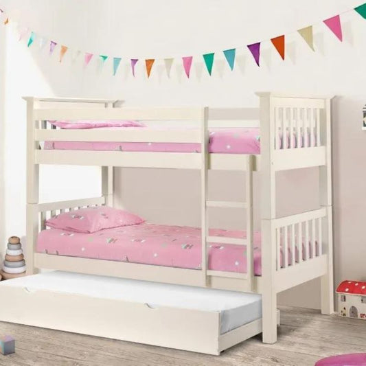 A white bunk bed adorned with pink sheets and a pink bedspread, creating a cheerful and inviting sleeping space.