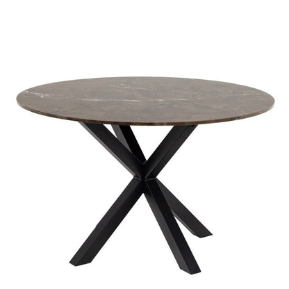 A round marble table featuring sleek black metal legs, elegantly designed for modern interiors.