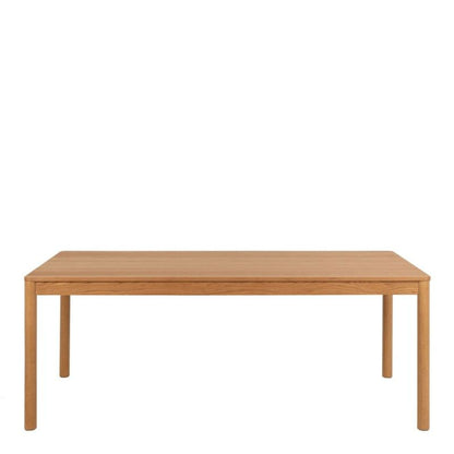 A wooden table featuring a smooth top and sturdy legs, showcasing natural wood grain and craftsmanship.