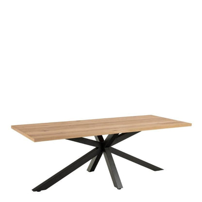 A table featuring a sturdy black metal base paired with a warm wooden top, showcasing a modern design aesthetic.