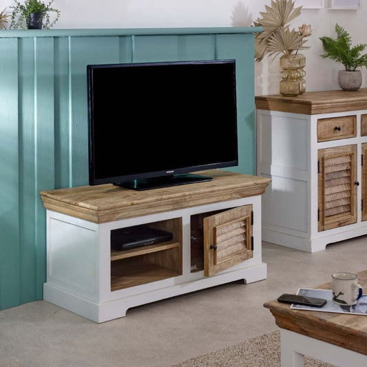  A white TV stand featuring wooden doors and drawers, elegantly designed for modern living spaces.