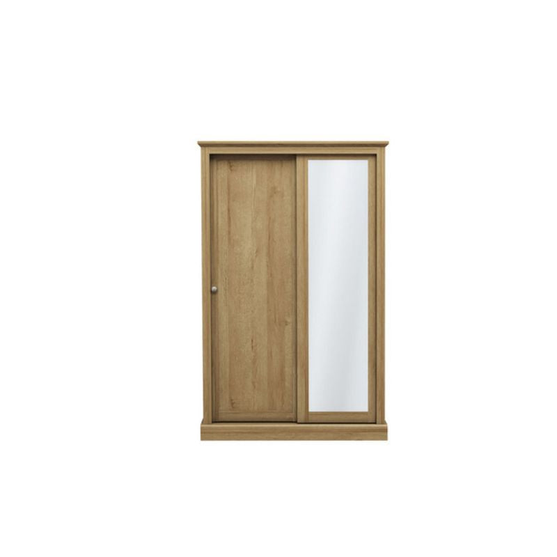 A wooden wardrobe featuring a mirror on its door, showcasing a classic and elegant design.