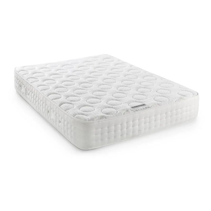 A white-covered mattress displayed against a plain white background, emphasizing its clean and minimalist design.