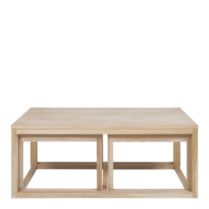 A solid wood coffee table showcasing natural grain and craftsmanship, enhancing the elegance of the living space.