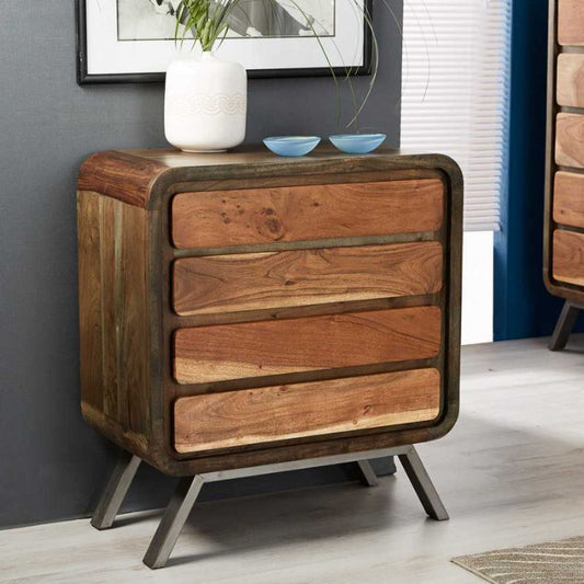 Wooden chest with drawers and vase on top.