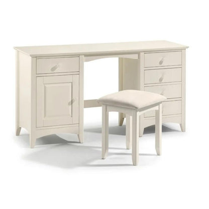 A white desk featuring drawers alongside a matching stool, creating a clean and organized workspace.