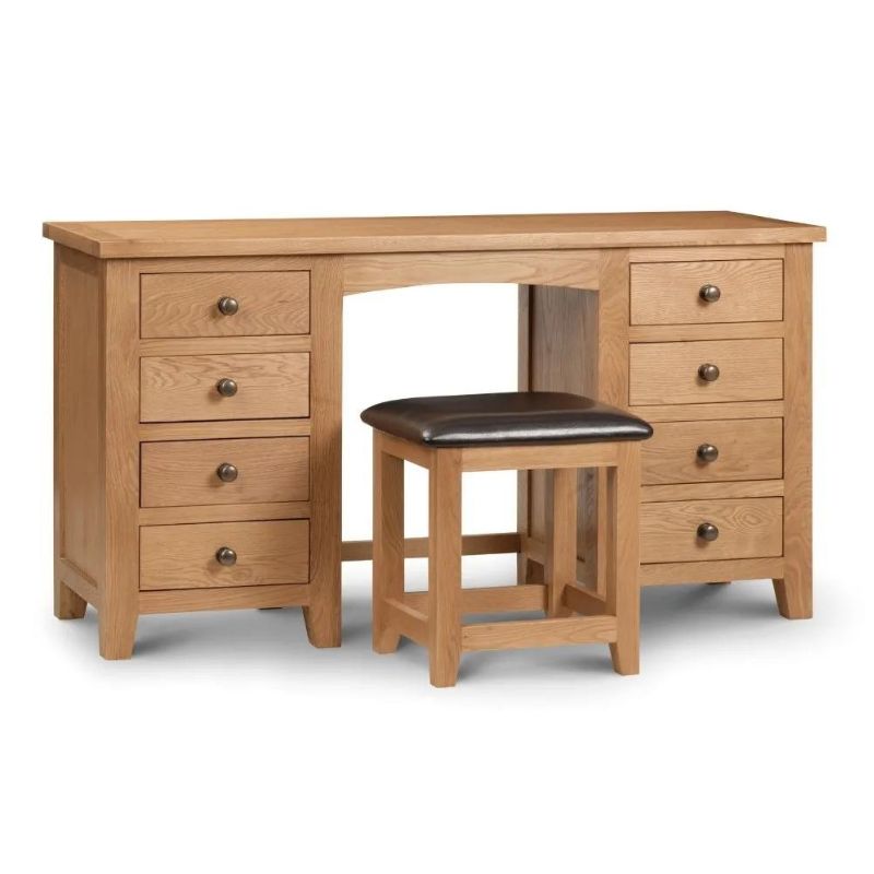 An oak dressing table featuring two drawers accompanied by a matching stool, elegantly designed for any bedroom setting.