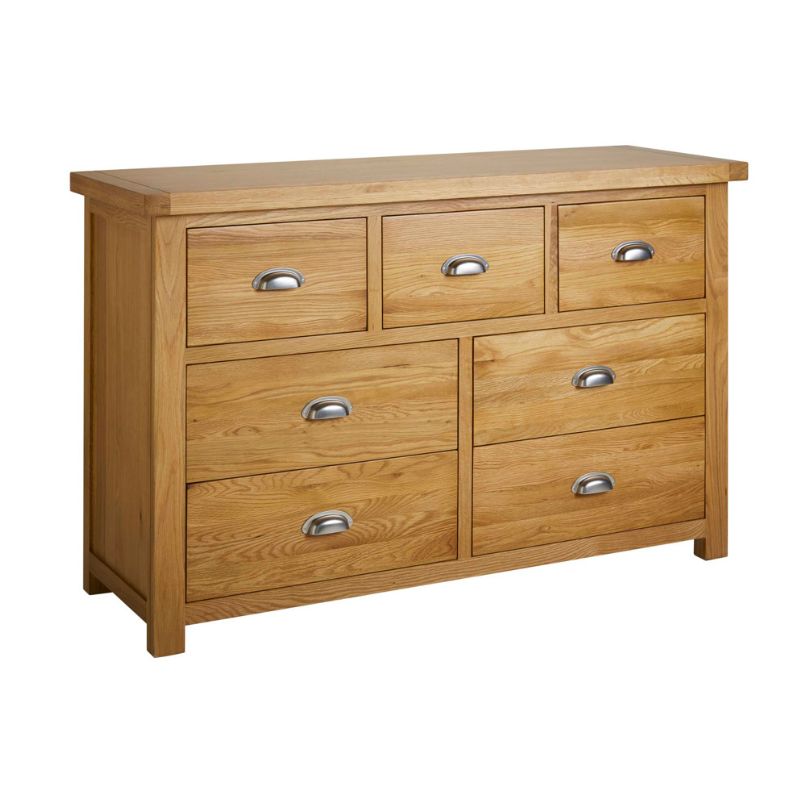 Oak dresser with 5 drawers and 2 doors, perfect for storing clothes and accessories.