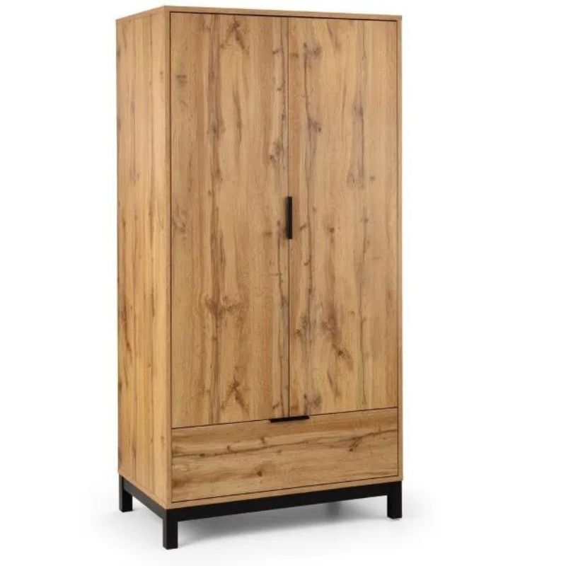 A wooden armoire featuring two elegantly designed doors, showcasing a classic and timeless furniture piece.