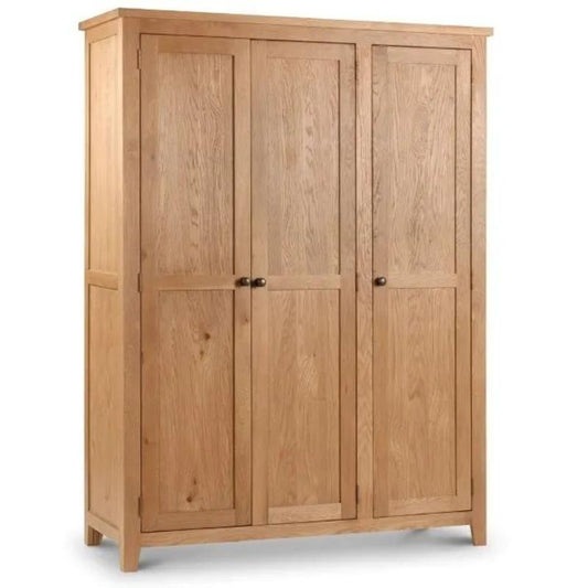 A wooden wardrobe featuring three doors, showcasing a classic design and natural finish, ideal for storage and organization.