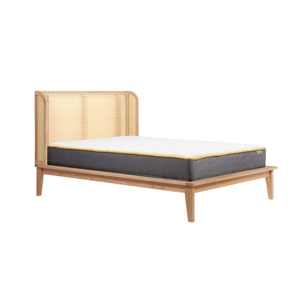 A wooden mattress featuring a design of yellow and white stripes, showcasing a unique and stylish appearance.