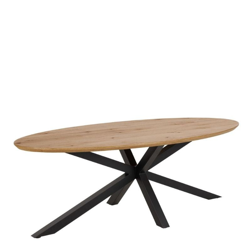 Oval table with sleek black metal legs.