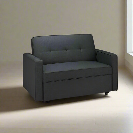 Contemporary grey sofa with sleek black arm rest.