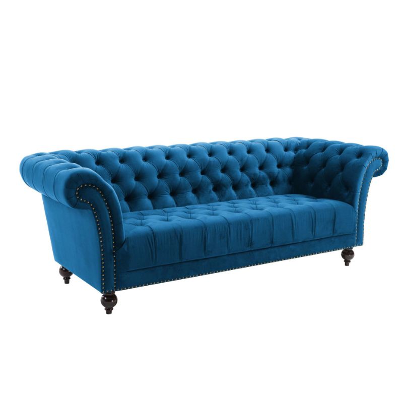 Blue velvet Chesterfield sofa, elegant and luxurious.